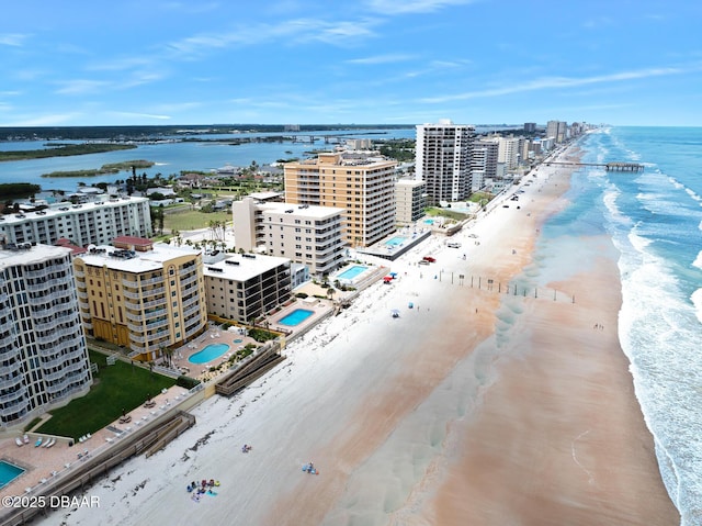 3807 S Atlantic Ave Unit 203, Daytona Beach, FL 32118 - aerial view of waterfront with a beach and a pool