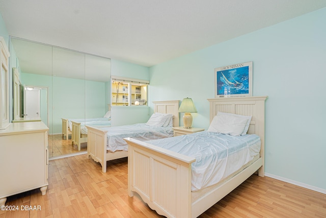 bedroom featuring light wood-type flooring