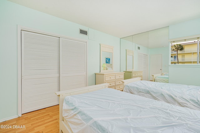 bedroom featuring light hardwood / wood-style floors