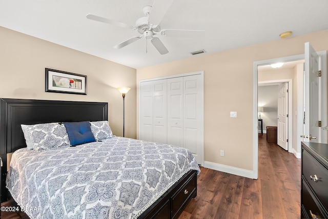 bedroom featuring ceiling fan, dark wood-type flooring, and a closet