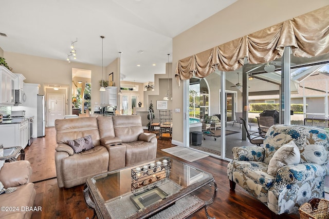 living room with dark hardwood / wood-style floors