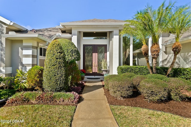 property entrance featuring french doors