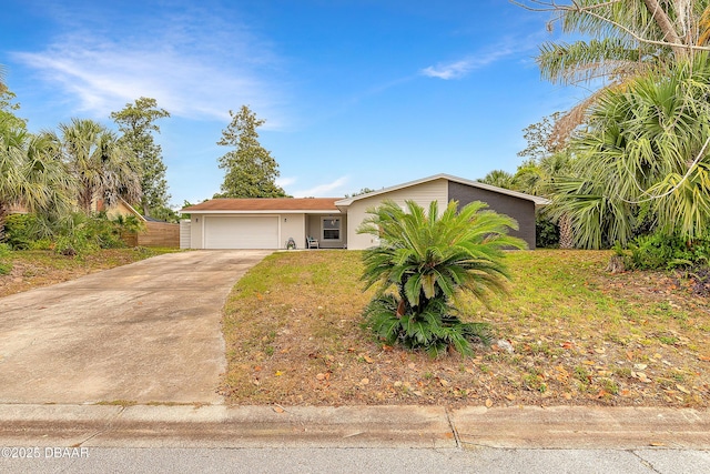 73 N St Andrews Dr, Ormond Beach, FL 32174 - view of front of property with concrete driveway, an attached garage, stucco siding, and fence