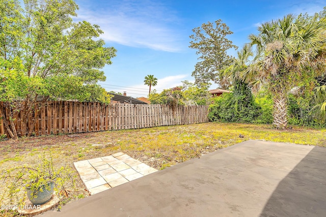 73 N St Andrews Dr, Ormond Beach, FL 32174 - view of yard with a patio area and fence