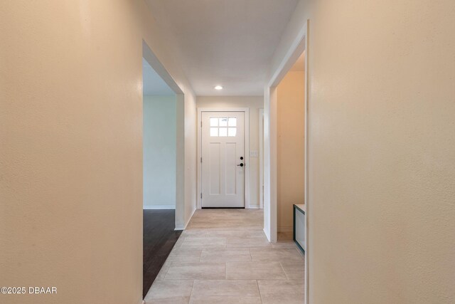 73 N St Andrews Dr, Ormond Beach, FL 32174 - hallway with recessed lighting, baseboards, and light tile patterned flooring