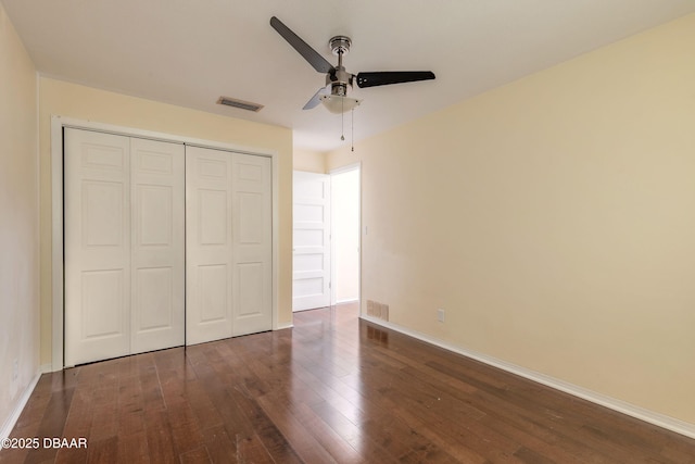 73 N St Andrews Dr, Ormond Beach, FL 32174 - unfurnished bedroom with hardwood / wood-style flooring, a closet, baseboards, and ceiling fan