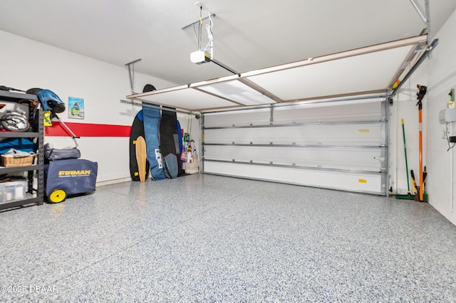 garage featuring a garage door opener