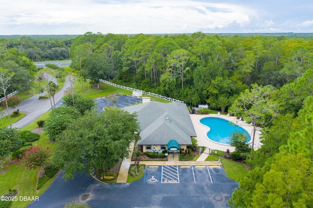 drone / aerial view with a view of trees