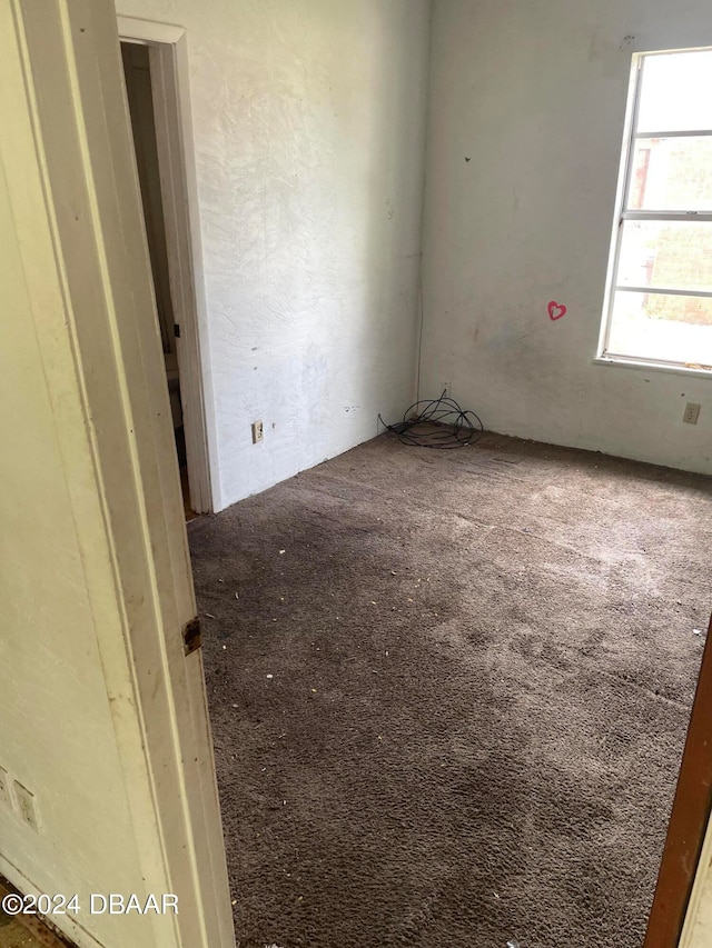 empty room with carpet floors