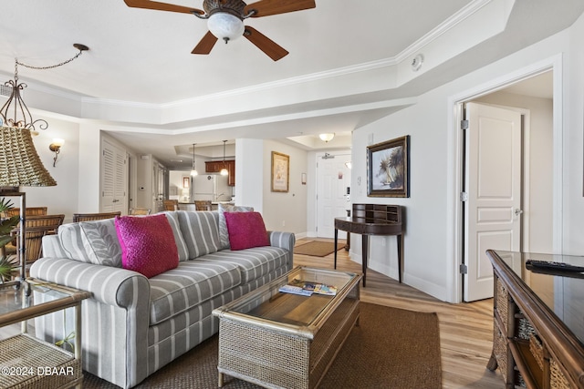 200 Ocean Crest Dr Unit 705, Palm Coast, FL 32137 - living room with ceiling fan, crown molding, and light wood-style floors