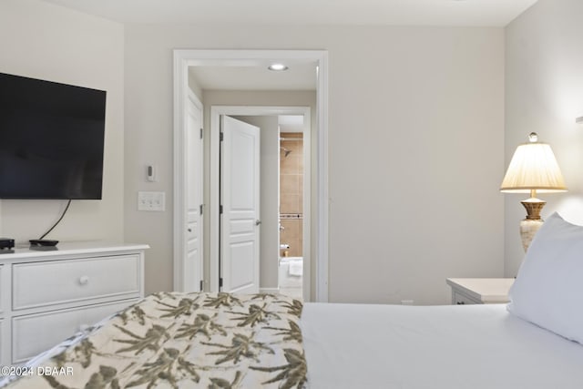 200 Ocean Crest Dr Unit 705, Palm Coast, FL 32137 - bedroom with ensuite bath