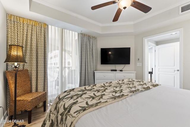 200 Ocean Crest Dr Unit 705, Palm Coast, FL 32137 - bedroom featuring light wood-type flooring, ornamental molding, and a ceiling fan