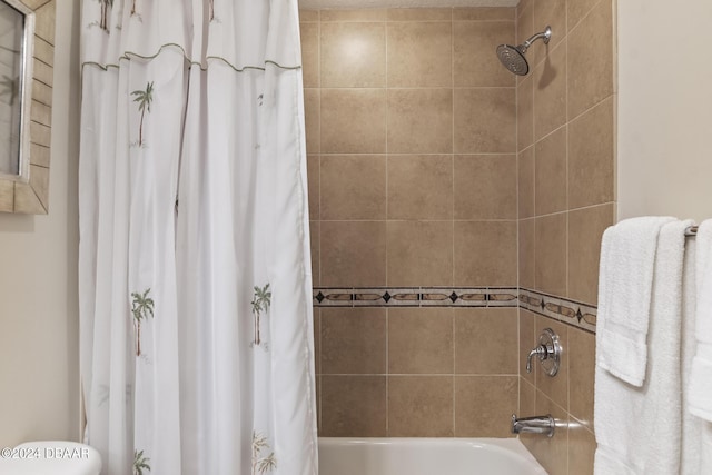200 Ocean Crest Dr Unit 705, Palm Coast, FL 32137 - bathroom with shower / tub combo with curtain and toilet