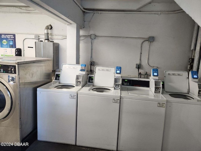 common laundry area featuring washing machine and dryer