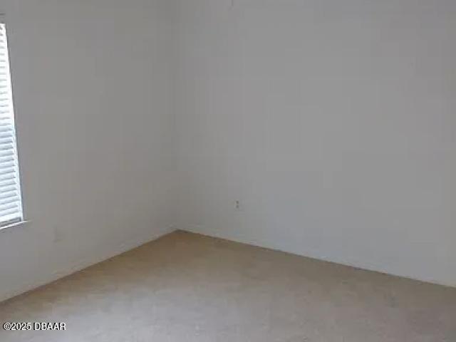 1600 Big Tree Rd Unit B3, South Daytona, FL 32119 - spare room with light colored carpet