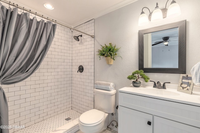 991 Dawson Dr, Deltona, FL 32725 - full bath with toilet, vanity, a tile shower, ceiling fan, and ornamental molding