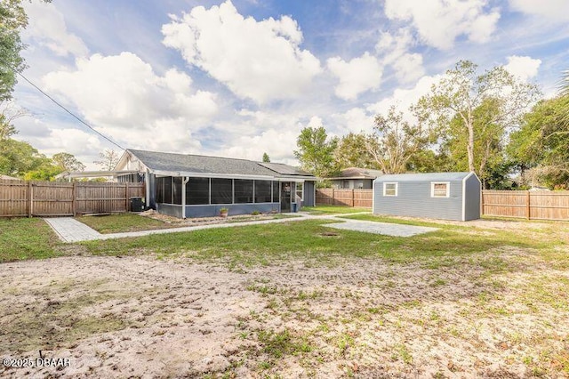 991 Dawson Dr, Deltona, FL 32725 - back of property with a sunroom and central AC unit