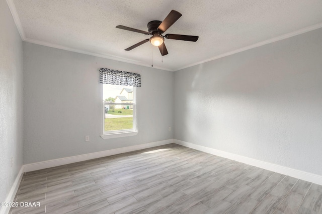 991 Dawson Dr, Deltona, FL 32725 - spare room featuring ornamental molding, a textured ceiling, wood finished floors, ceiling fan, and baseboards