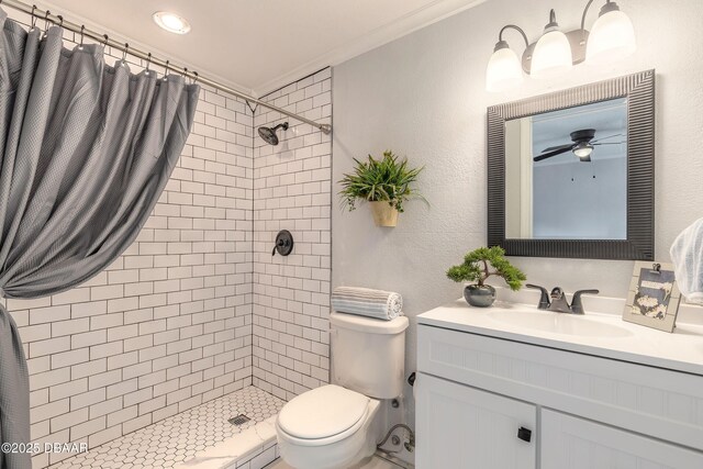 991 Dawson Dr, Deltona, FL 32725 - full bath with toilet, vanity, a tile shower, ceiling fan, and ornamental molding