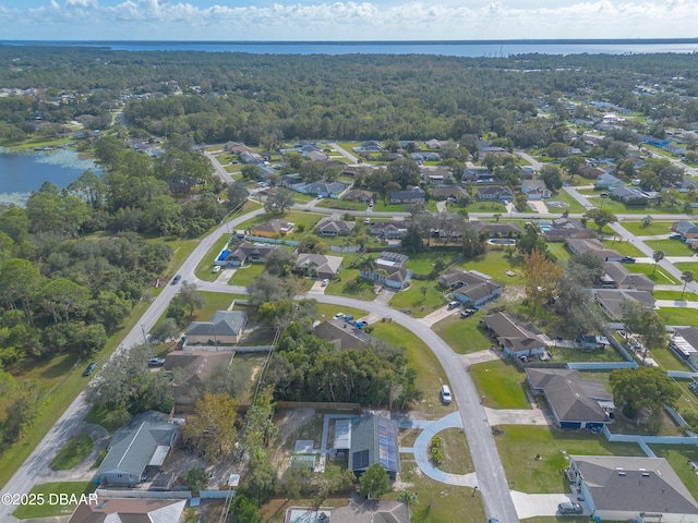 991 Dawson Dr, Deltona, FL 32725 - aerial view of property and surrounding area with a nearby body of water, nearby suburban area, and a heavily wooded area