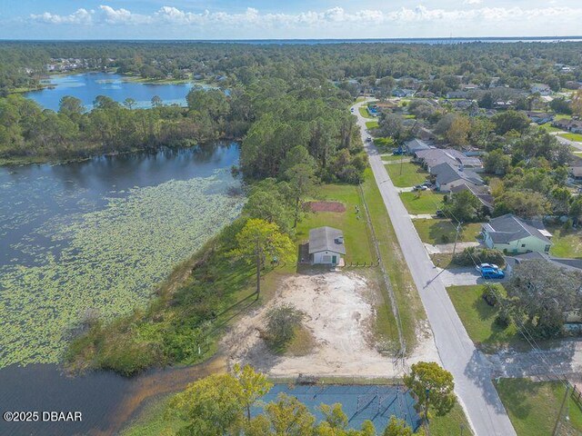 991 Dawson Dr, Deltona, FL 32725 - drone / aerial view of a nearby body of water and a forest
