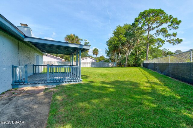 909 Northbrook Dr, Ormond Beach, FL 32174 - fenced backyard featuring a deck