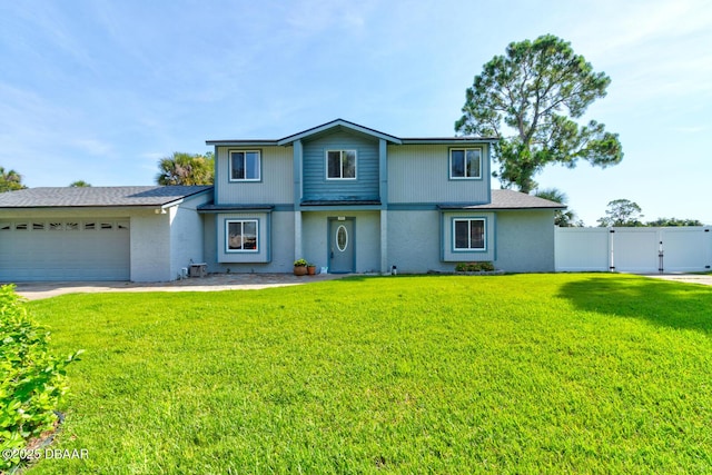 909 Northbrook Dr, Ormond Beach, FL 32174 - traditional-style house with a gate, an attached garage, concrete driveway, and stucco siding