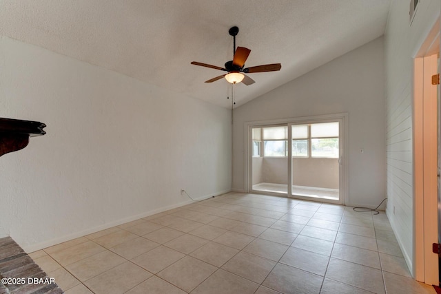 909 Northbrook Dr, Ormond Beach, FL 32174 - unfurnished room featuring vaulted ceiling, a ceiling fan, light tile patterned floors, and a textured ceiling