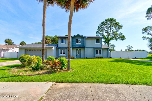 909 Northbrook Dr, Ormond Beach, FL 32174 - traditional home with a gate, stucco siding, an attached garage, and concrete driveway
