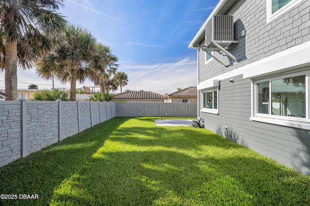 view of yard with a fenced backyard