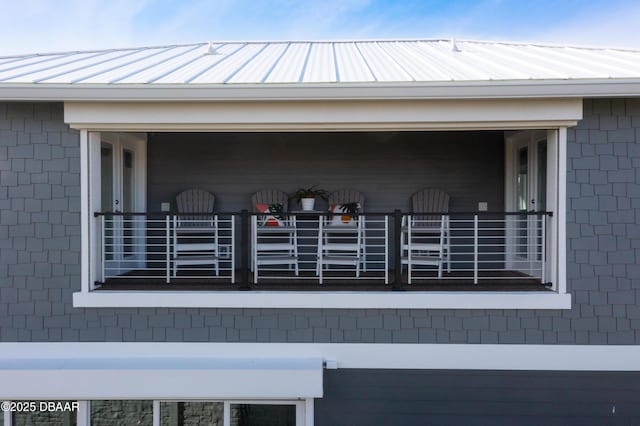 exterior space with metal roof and a standing seam roof