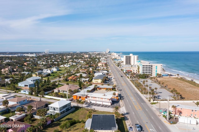 bird's eye view with a beach view and a water view
