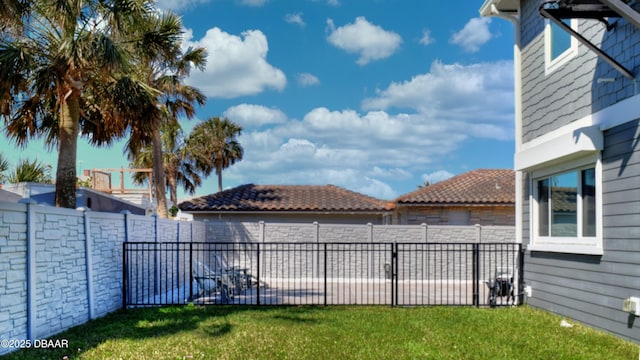 view of yard featuring a fenced backyard
