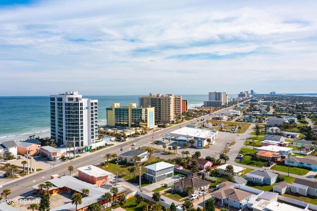 aerial view featuring a water view and a city view