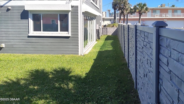 view of yard featuring fence