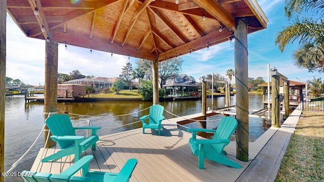 21 Curry Ct, Palm Coast, FL 32137 - dock area with boat lift and a water view