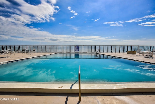 4139 S Atlantic Ave Unit B204, New Smyrna Beach, FL 32169 - community pool with a patio area