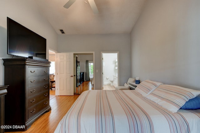 bedroom with ceiling fan, light wood-type flooring, connected bathroom, and visible vents