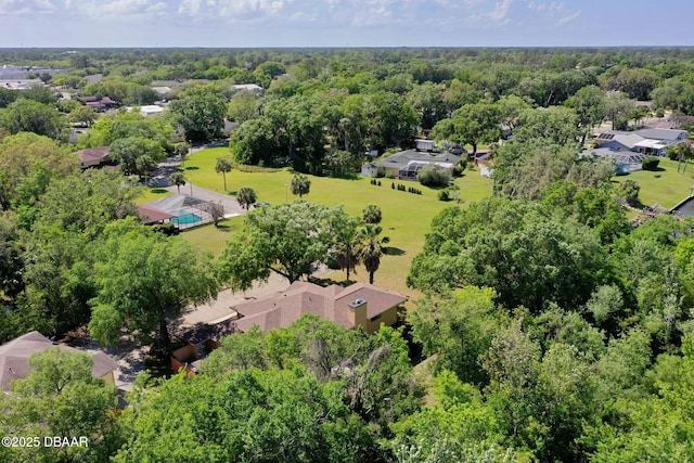 bird's eye view featuring a view of trees