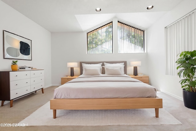 bedroom featuring light colored carpet, baseboards, vaulted ceiling, and recessed lighting