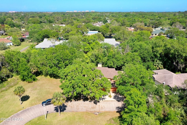 aerial view with a wooded view