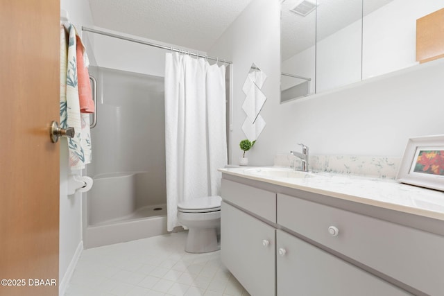 full bath featuring curtained shower, toilet, a textured ceiling, vanity, and tile patterned floors