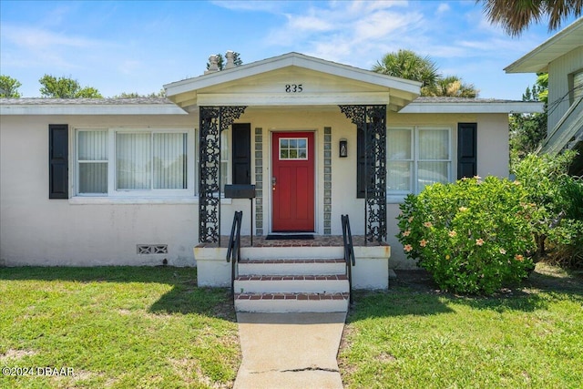 view of front of home with a front yard