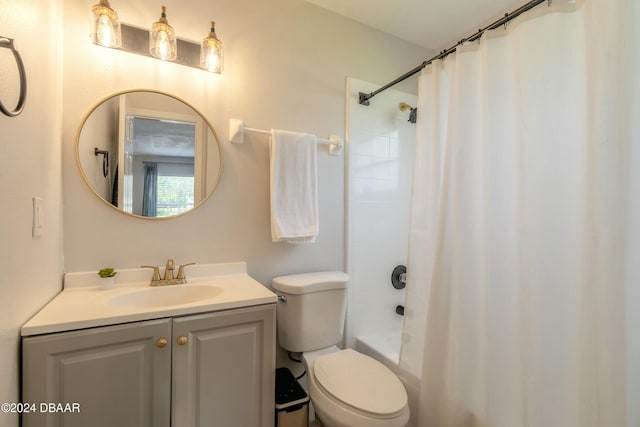415 Banana Cay Dr Unit F, South Daytona, FL 32119 - full bathroom with toilet, vanity, and shower / bathtub combination with curtain