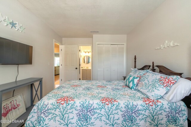 415 Banana Cay Dr Unit F, South Daytona, FL 32119 - bedroom featuring a closet