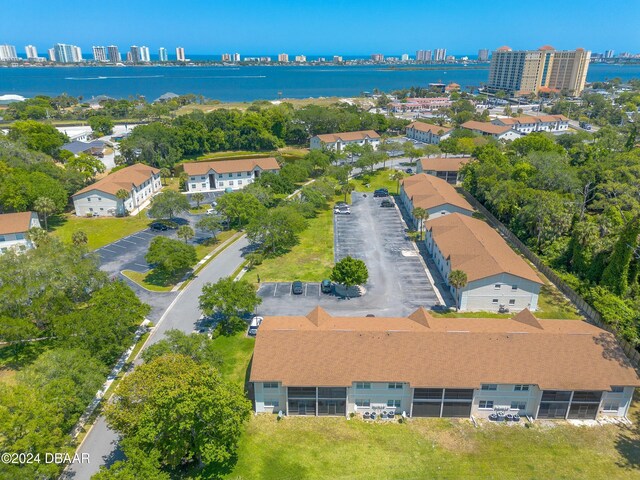 415 Banana Cay Dr Unit F, South Daytona, FL 32119 - aerial overview of property's location featuring a nearby body of water and nearby urban area