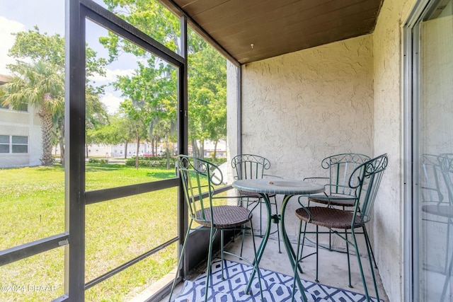 415 Banana Cay Dr Unit F, South Daytona, FL 32119 - sunroom / solarium with healthy amount of natural light and lofted ceiling