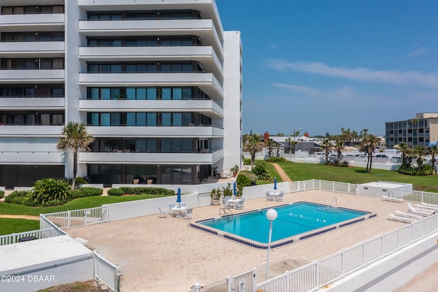 view of pool featuring a patio