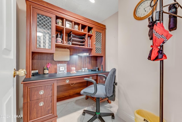 901 S Atlantic Ave Unit 102, Ormond Beach, FL 32176 - office featuring built in study area and light tile patterned floors