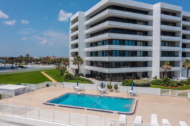 901 S Atlantic Ave Unit 102, Ormond Beach, FL 32176 - community pool with a patio